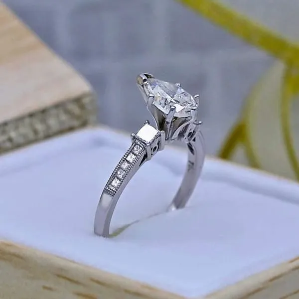 Engagement Ring features Center 100ct Pear Shape Diamond ENG7509 Diamond Source NYC Rings