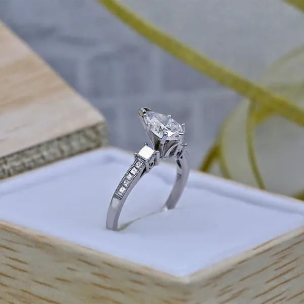 Engagement Ring features Center 100ct Pear Shape Diamond ENG7509 Diamond Source NYC Rings