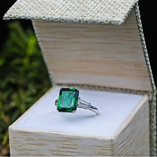 Rings Diffused Green Emerald cut 3 Stone Diamond Engagement Ring W Tapered Baguette Diamonds Set in Platinum 650ct tw Diamond Source NYC