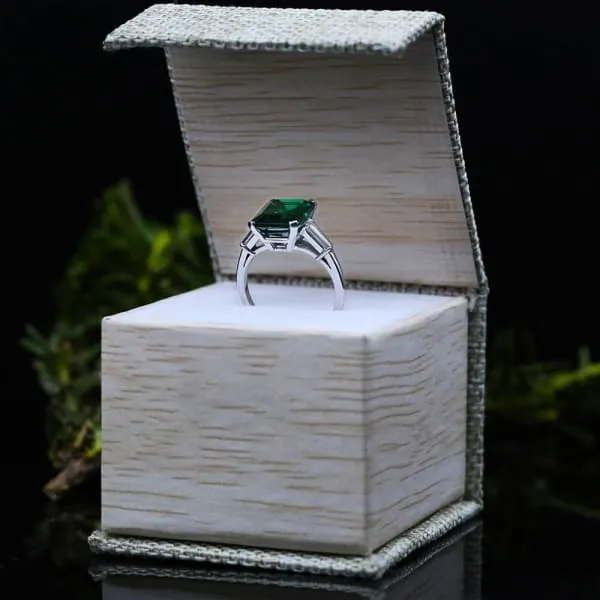 Rings Diffused Green Emerald cut 3 Stone Diamond Engagement Ring W Tapered Baguette Diamonds Set in Platinum 650ct tw Diamond Source NYC